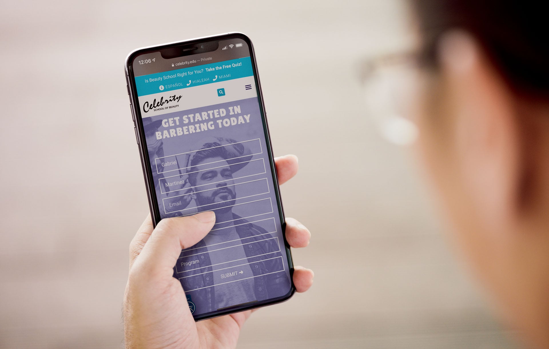 Celebrity School of Beauty contact form displayed on a phone that a young person is using.