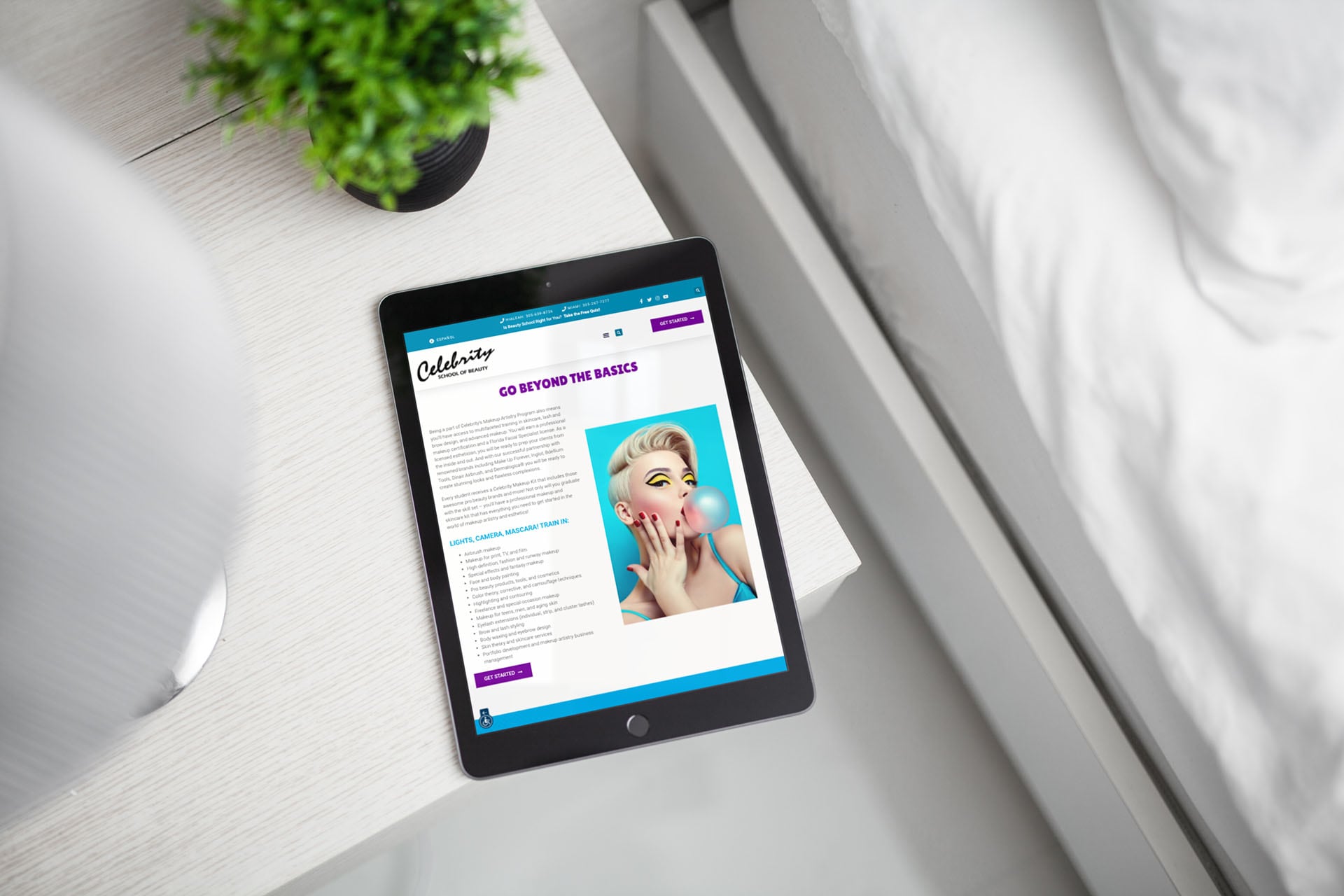 Celebrity School of Beauty website displayed on a tablet on a bedside table.