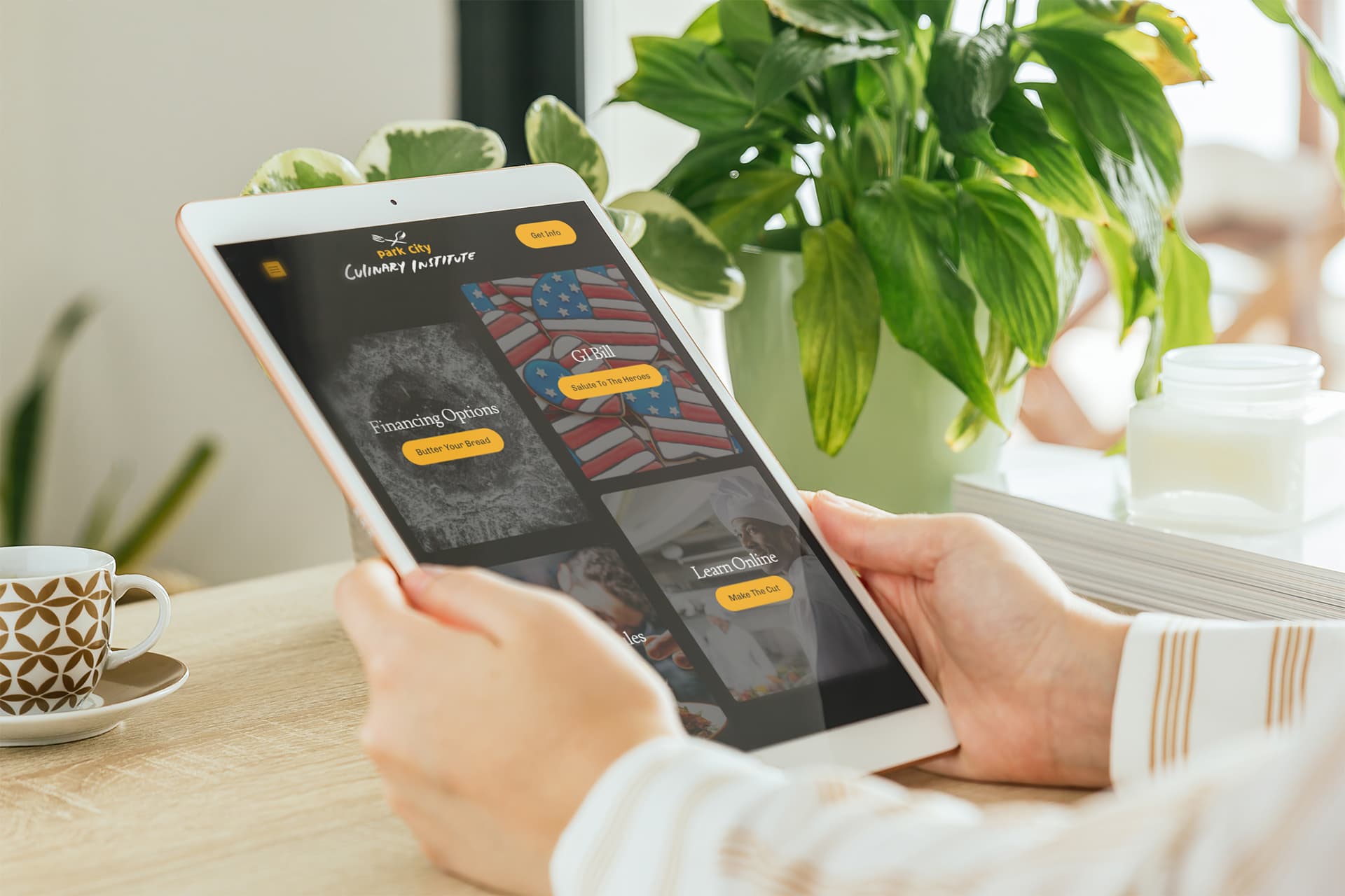 The Park City Culinary Institute's student services page displayed on a tablet in somebody's hands.