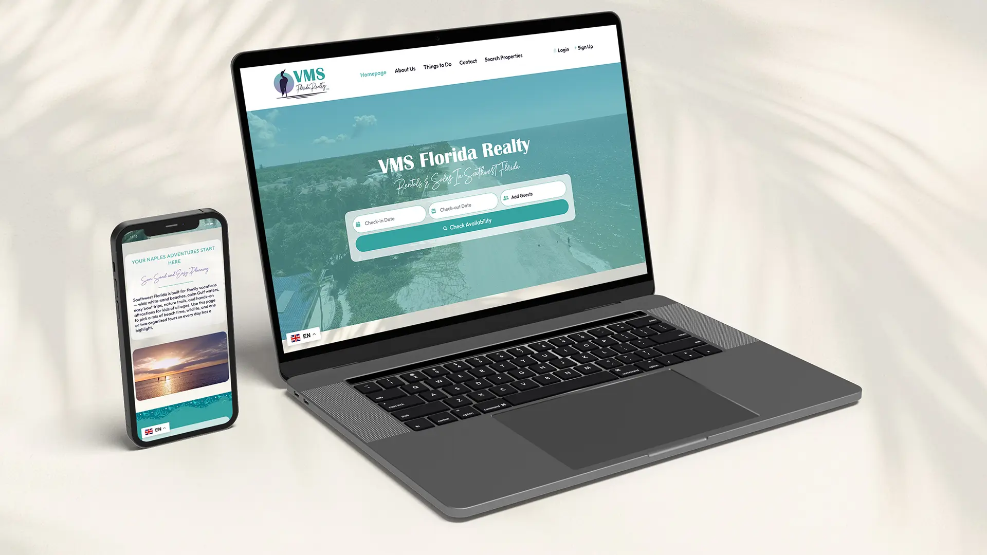 VMS Florida Realty website displayed on a laptop and mobile phone.