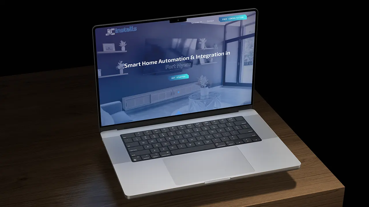 JC Installs website design displayed on a laptop, featuring the homepage hero section.