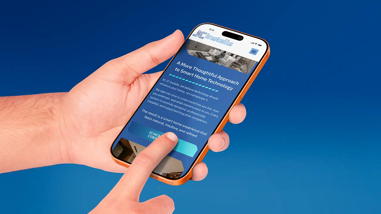 JC Installs website design displayed on a mobile phone, displaying the about section.