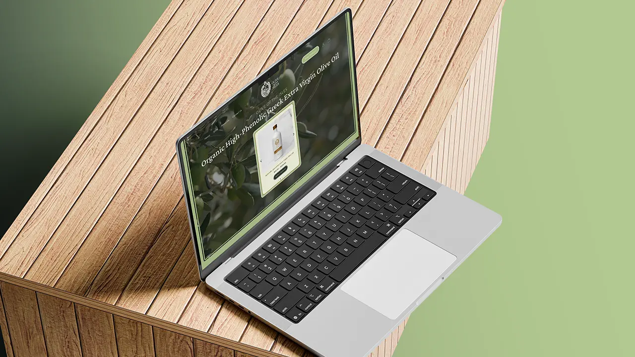 Olive of the Isles website displayed on a laptop, featuring the homepage hero section.