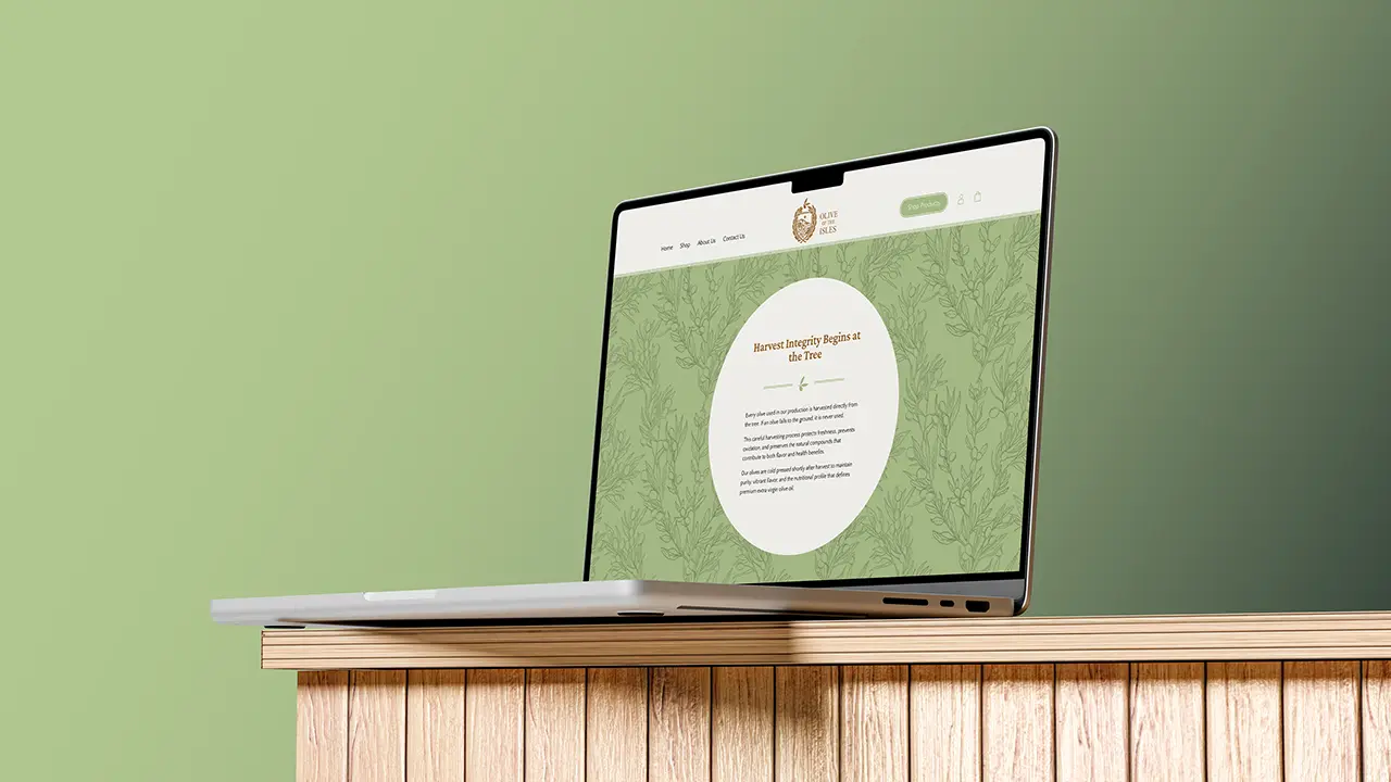 Olive of the Isles website displayed on a laptop, featuring the homepage brand section.