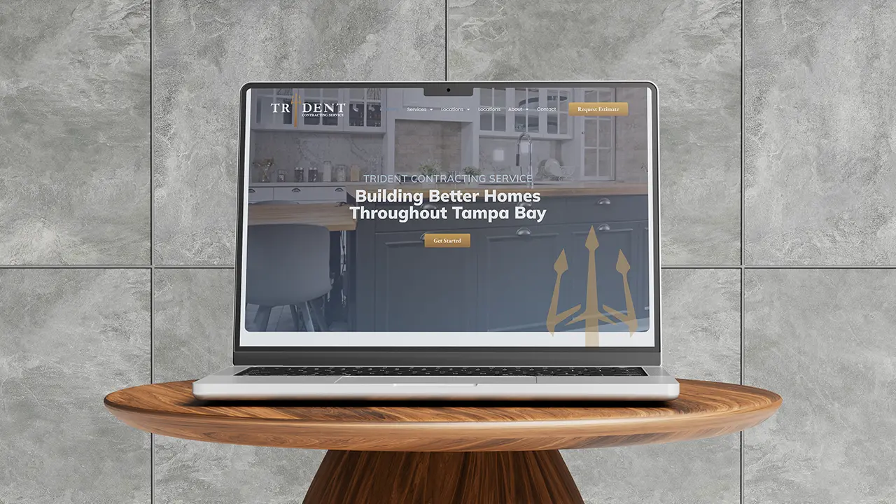 Trident Contracting Service website displayed on a laptop, featuring the homepage hero section.